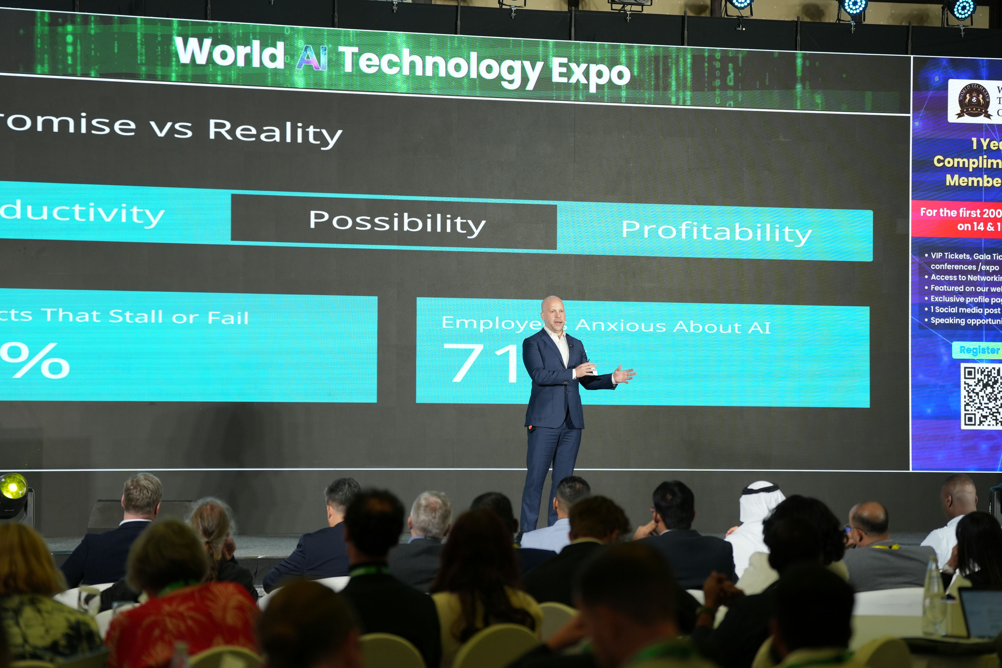 Fahed Bizzari at the stage edge mid-keynote